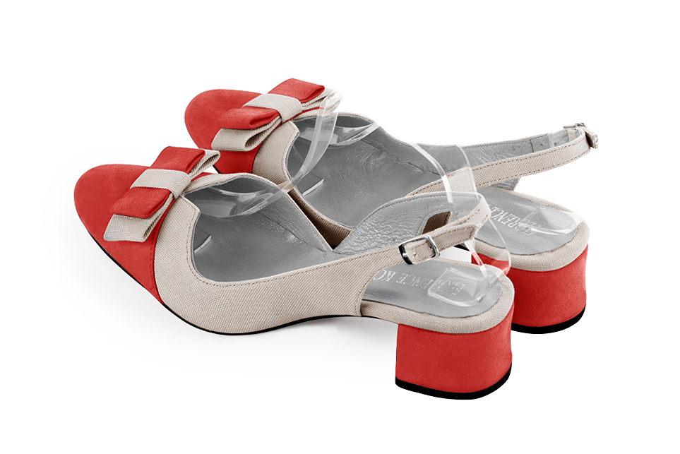 French elegance and refinement for these scarlet red and gold dress slingback shoes, with a knot, 
                available in many subtle leather and colour combinations. The pretty French spirit of this beautiful pump will accompany your steps nicely and comfortably.
To be personalized or not, with your materials and colors.  
                Matching clutches for parties, ceremonies and weddings.   
                You can customize these shoes to perfectly match your tastes or needs, and have a unique model.  
                Choice of leathers, colours, knots and heels. 
                Wide range of materials and shades carefully chosen.  
                Rich collection of flat, low, mid and high heels.  
                Small and large shoe sizes - Florence KOOIJMAN